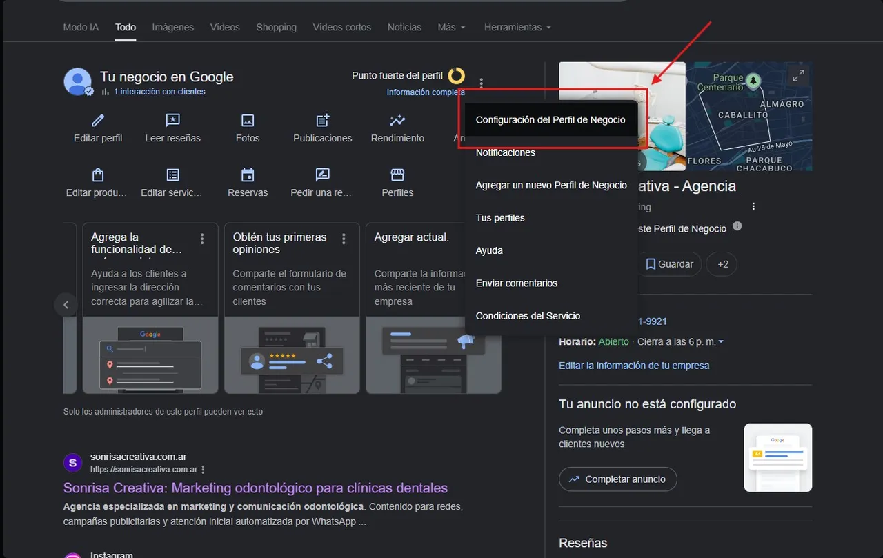 Menú desplegado mostrando la opción Configuración del Perfil de Negocio